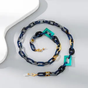 Macro shot of colorful acrylic geometric chain links for eyewear or masks