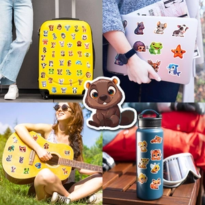 Waterproof cartoon animal stickers shown on luggage, laptop, guitar and water bottle