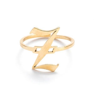 Detail shot of vintage golden ring featuring a gothic-style capital letter Z design