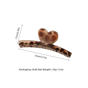 Detail view of large leopard heart hair claw clip showing 13cm length and 5.5cm height