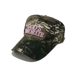 Detail of pink 3D embroidery on a woodland camouflage cotton baseball cap