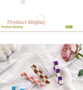 Close-up of wavy checkered hair clips in pastel colors with creative aesthetic styling