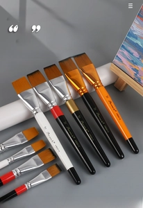Macro detail of 1.5-inch nylon brush with birch handle and aluminum ferrule for painting