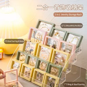 Transparent PE film jewelry storage boxes in various sizes on a decorative display stand
