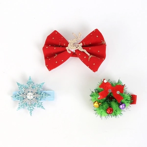 Christmas hair clips set including glitter reindeer bow, snowflake, and bell wreath