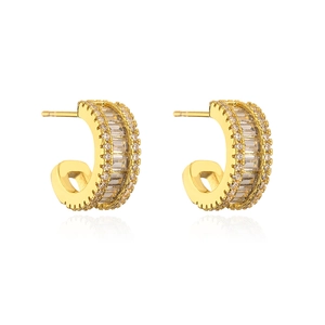 Detail of 18K gold plated C-shaped earrings with baguette and round cubic zirconia
