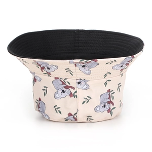 Close-up of cute koala print bucket hat featuring a dual-layer reversible cotton design