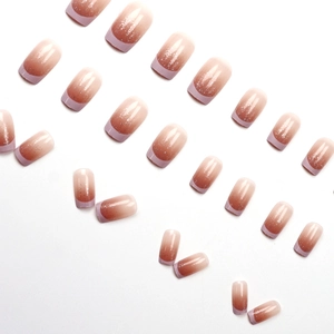 French gradient press-on nails set in nude and purple with silver glitter accents