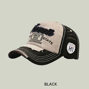 Vintage washed denim baseball cap with Hawaii embroidery and distressed details in black