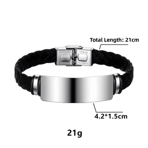 Detail showing the 21cm braided leather bracelet with a 4.2x1.5cm polished metal plate