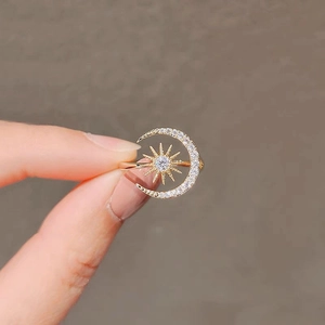 Exquisite gold sun and crescent moon open ring with sparkling white pavé crystals