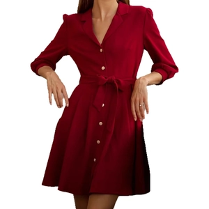 Detail of burgundy button-down shirt dress with elegant collar and waist tie belt