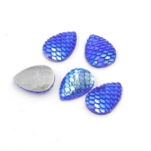Close-up of 13x18mm teardrop resin charms with blue fish scale texture and AB luster