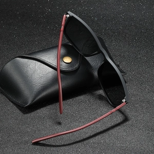 Polarized TR square sunglasses with matte black frames and red textured temples