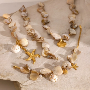 Marine stainless steel jewelry set with shell pearls and golden starfish charms