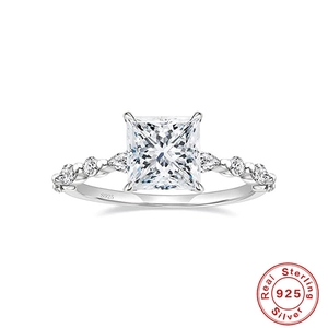 Macro detail of S925 sterling silver ring with square cut diamond and hallmark