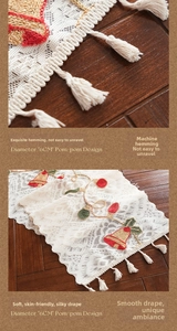 Detail of Christmas table runner with bell embroidery and 6cm diameter pom-pom fringe