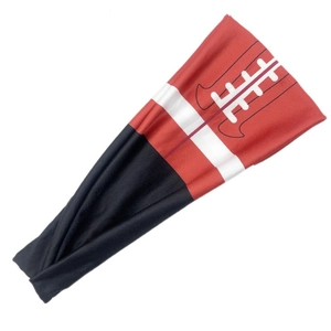 Detail shot of the elastic red and black patterned sports headband for running and basketball