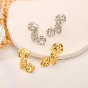 Hammered gold and silver stainless steel earrings with irregular texture and drop design