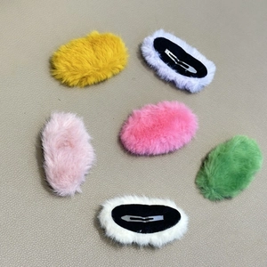 Cute faux fur plush hair clips set in vibrant candy colors for girls' winter styling