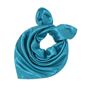 Detail of teal satin square scarf showing smooth glossy texture and neat stitched edges