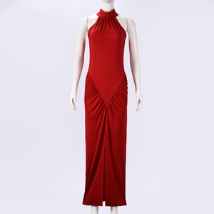 Detail view of the red halter neck dress showing elegant pleats and ruching textures