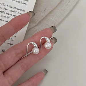 Minimalist S925 silver pearl stud earrings with a sleek streamlined hook design