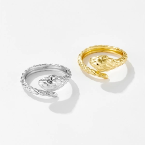 Adjustable snake-shaped rings in gold and silver finish with textured scales pattern