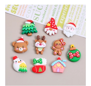 Flat lay macro of 10 colorful Christmas resin charms for DIY craft making and decoration