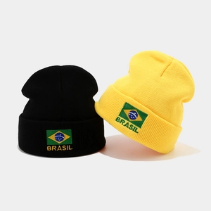 Knit Brazil flag beanie in black and yellow with embroidered Brasil logo for winter