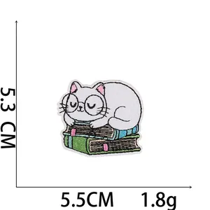 Embroidered sleeping cat patch on books, 5.5cm width DIY iron-on applique for clothing
