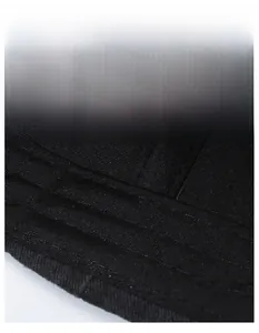 Detail view of the wide moisture-wicking sweatband inside the black baseball cap