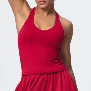 Detail of red V-neck sports bra and high-waist shorts set in breathable stretch fabric