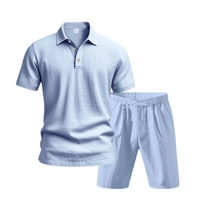 Close-up of light blue linen polo and shorts set showing breathable fabric texture