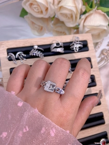 Macro shot of silver belt-buckle style ring with micro-pave cubic zirconia inlay