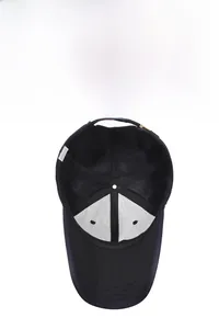 Detail view of black baseball cap interior with breathable mesh and lining