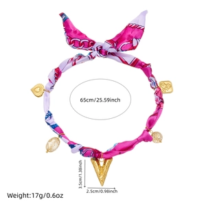 Detail of silk scarf necklace showing 65cm length and V-shaped pendant dimensions