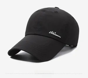 Detail view of the NALAS embroidery on black baseball cap with durable stitching