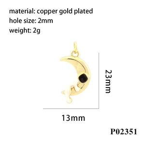 Detail of 23x13mm gold crescent moon pendant with black stone and technical specs