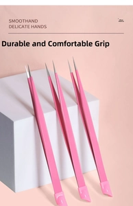 Detailed macro view of pink stainless steel nail art tweezers with silicone pressing head