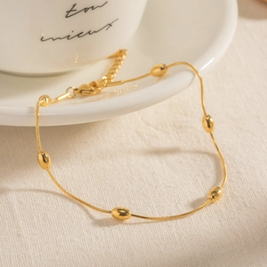 Elegant 925 sterling silver gold-plated snake chain bracelet with oval beads