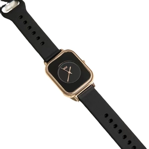 Minimalist square quartz watch with black silicone strap and golden case for women