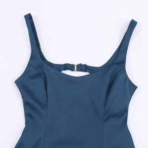 Blue sporty midi dress with wide straps and smooth elastic fabric on white background