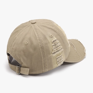 Distressed khaki cotton baseball cap with vintage worn details and adjustable metal buckle