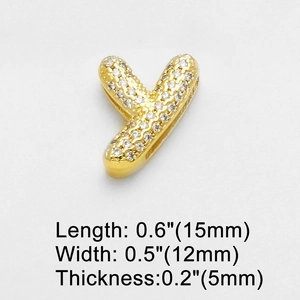 Macro view of gold plated Y-letter pendant with sparkling zircon micro-pave setting