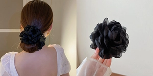 Detail of elegant black mesh flower hair claw clip on model and close-up of fabric petals