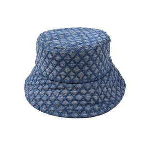 Classic denim blue quilted bucket hat with flat top and wide brim for children