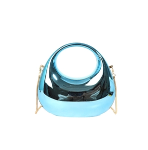 Sweet blue metallic handbag with circular cutout handle and elegant gold chain strap
