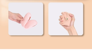 Pink silicone makeup brush bag showing flexible material and golden snap closure