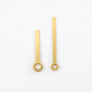 Minimalist matte gold quartz clock hands set with hour and minute hands on white background